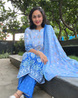 Blue floral print regular Kurta with trouser and dupatta by Vastra by Monty